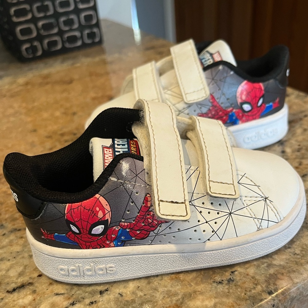 Adidas White and Black Sneakers with Classic Design